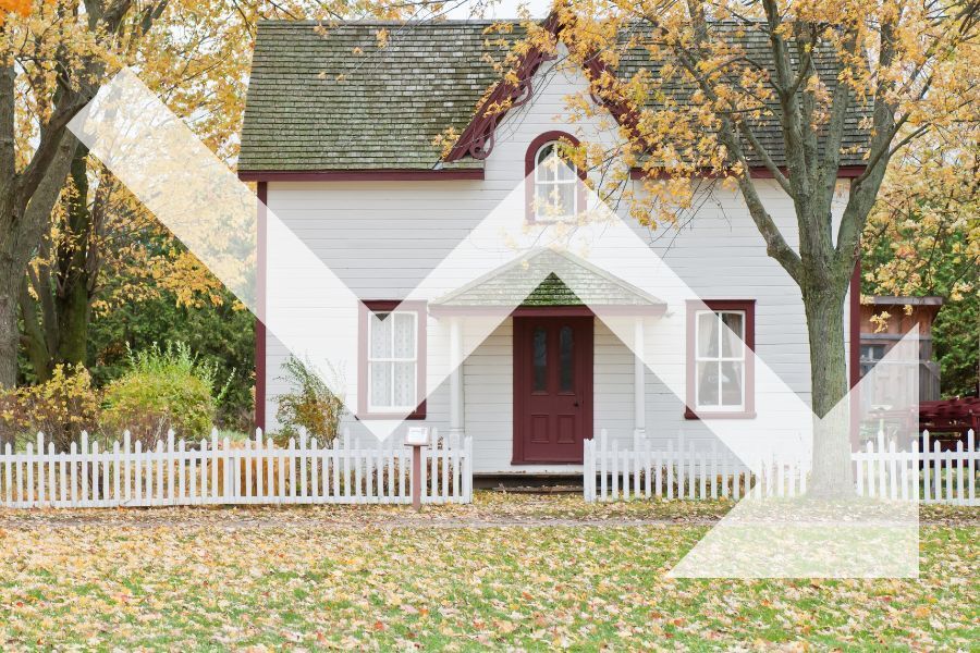 Picture of a home with an arrow pointing down
