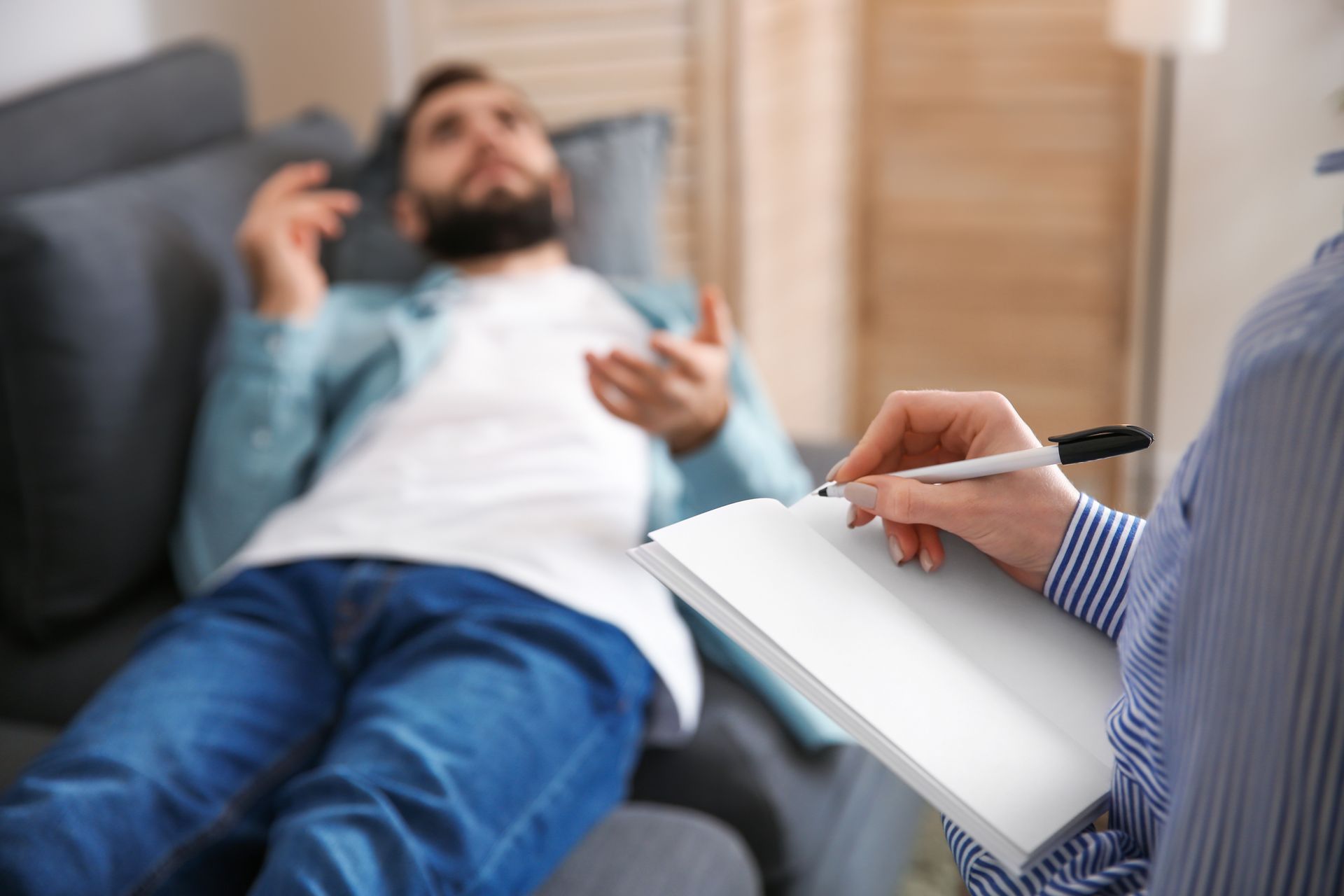 man during hypnotherapy session