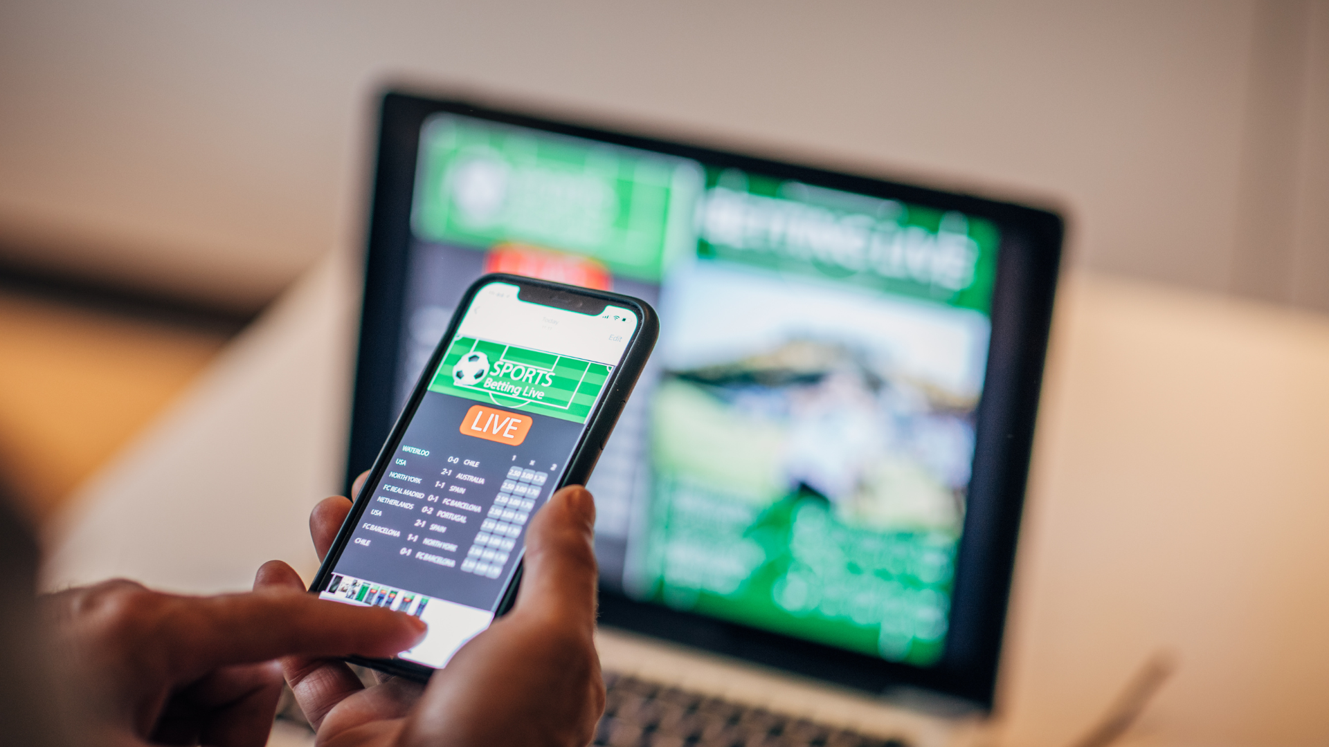 a person gambling using a phone