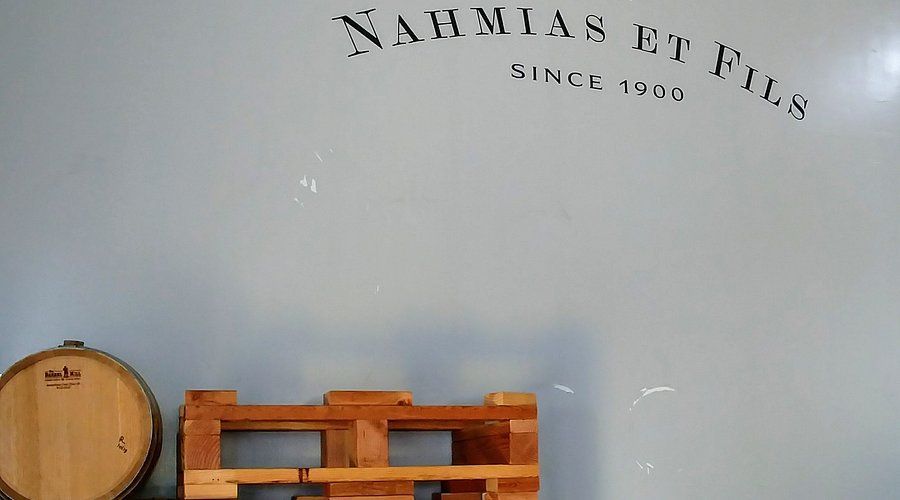A white board with the word nahmia written on it