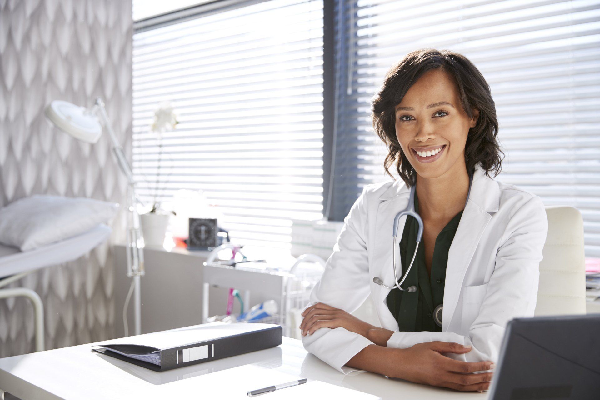 Physician Sitting at Desk