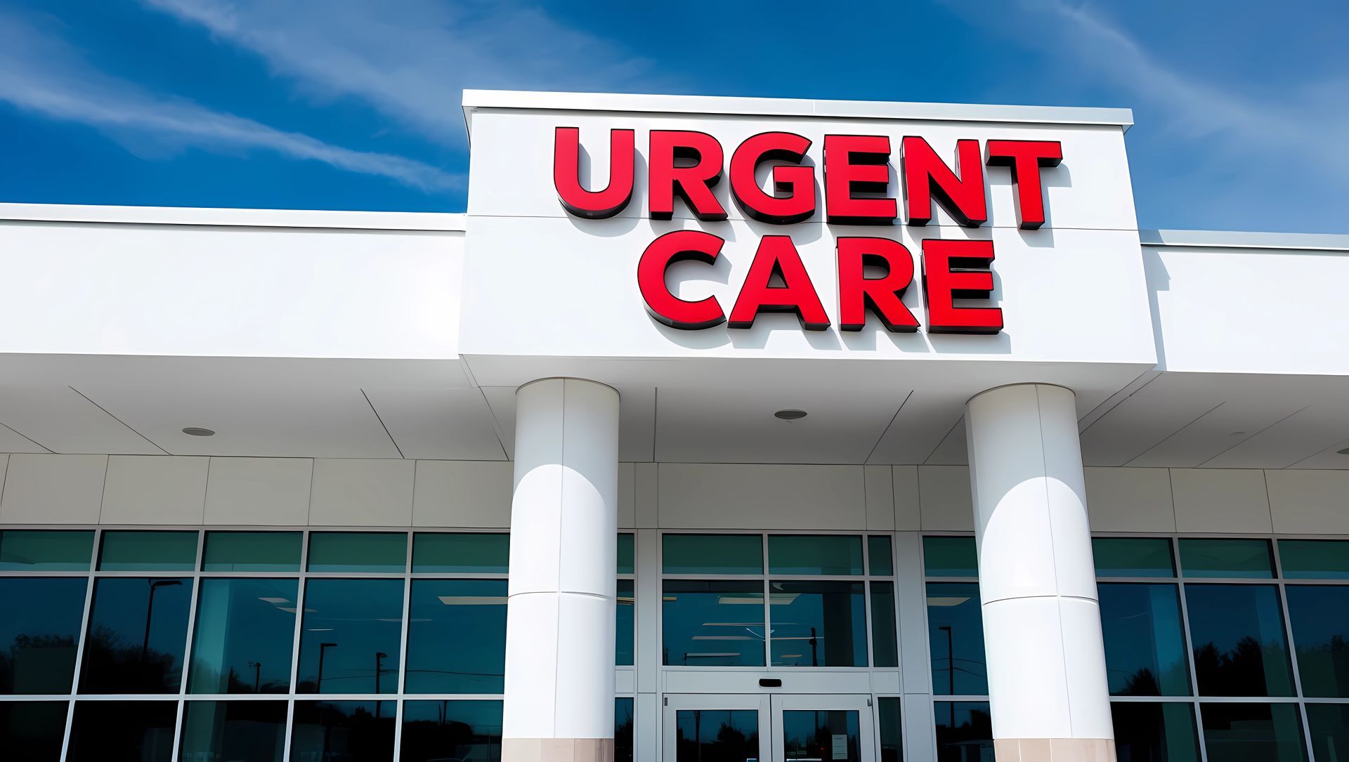 The front of an urgent care center with a blue sky in the background