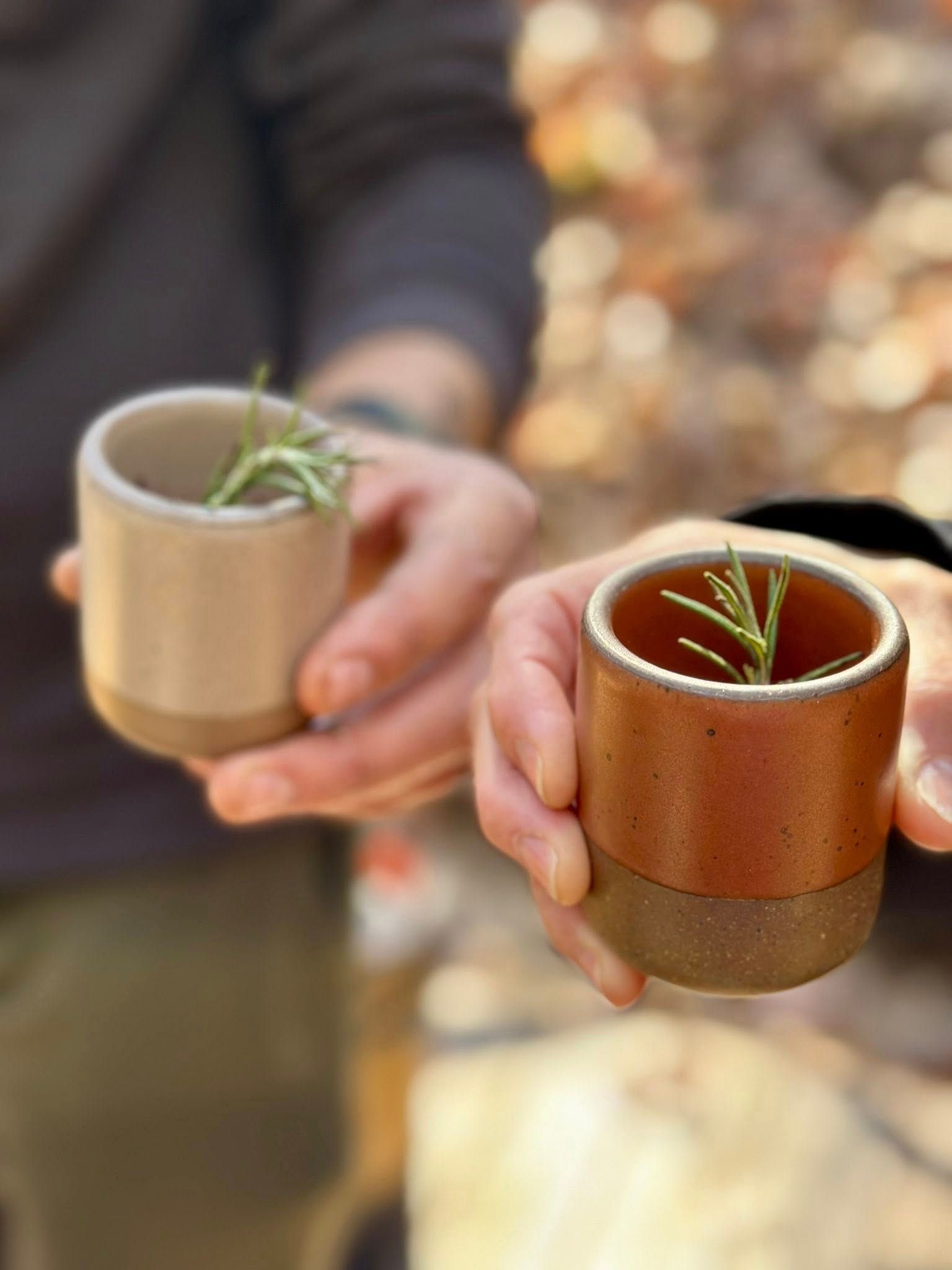 romantic couple Neutral tones, soft blankets, warm stone wall — the whole scene feels peaceful, safe, and private.