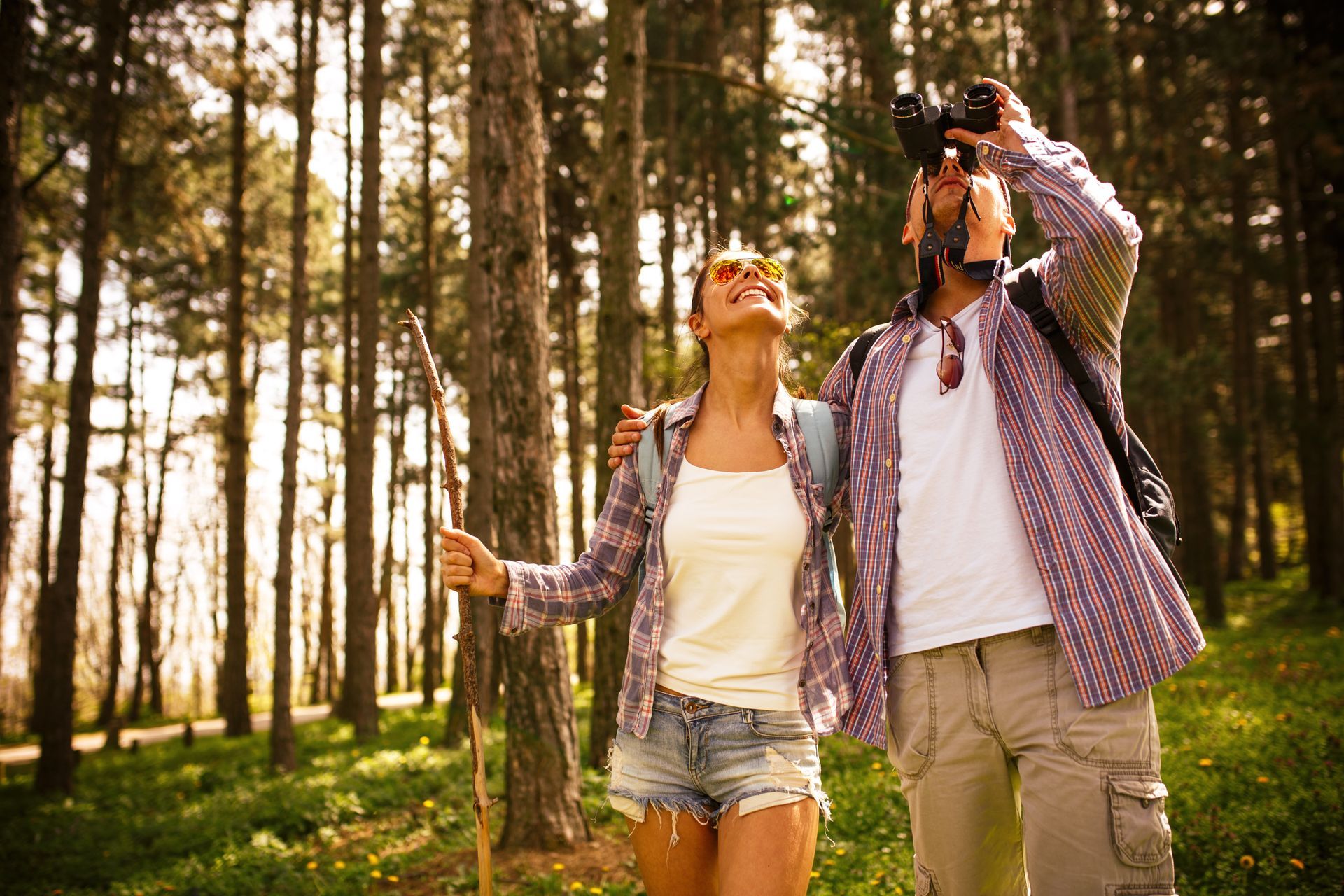 A man and a woman are birdwatching in NC