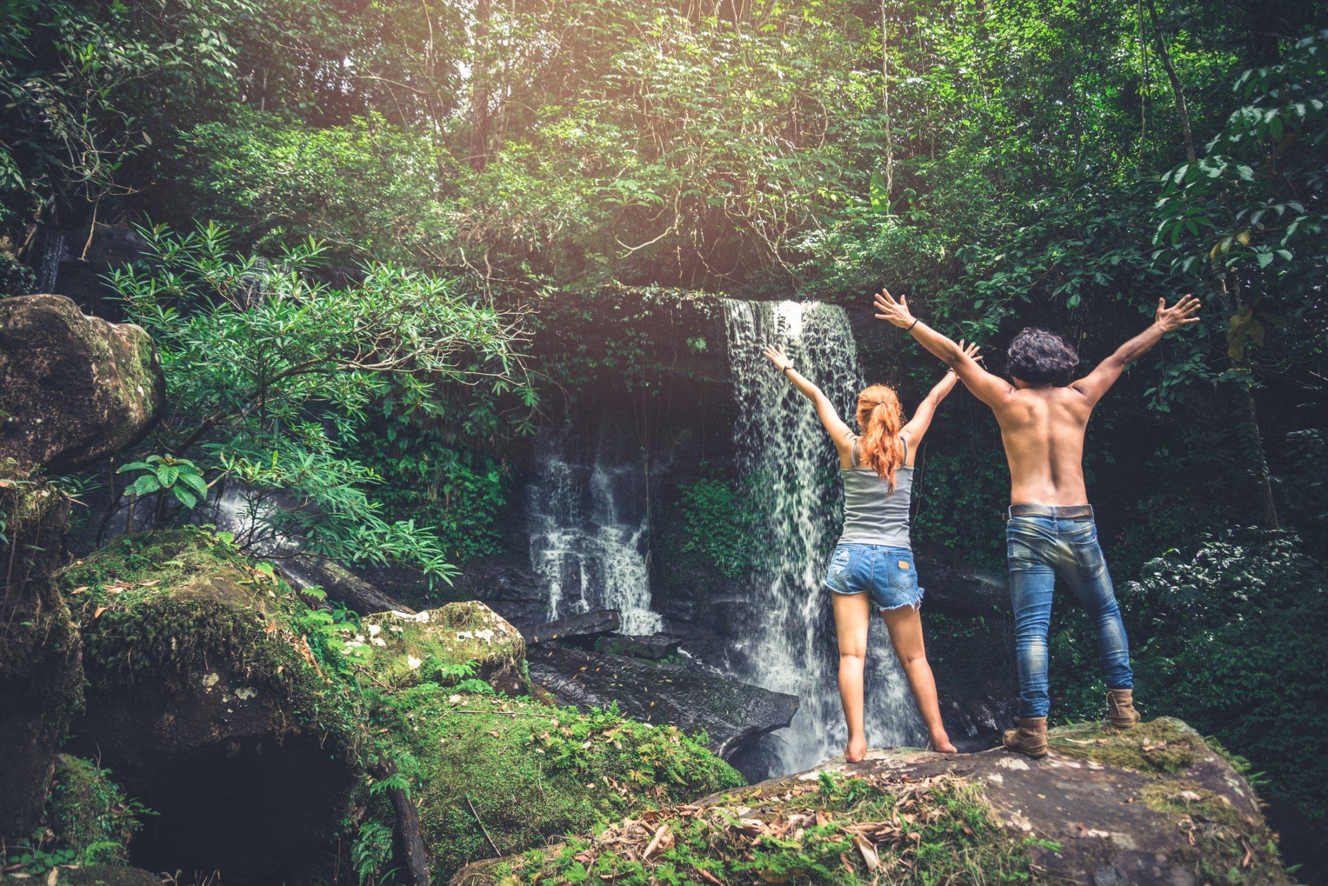 A group of people are hiking in the woods.