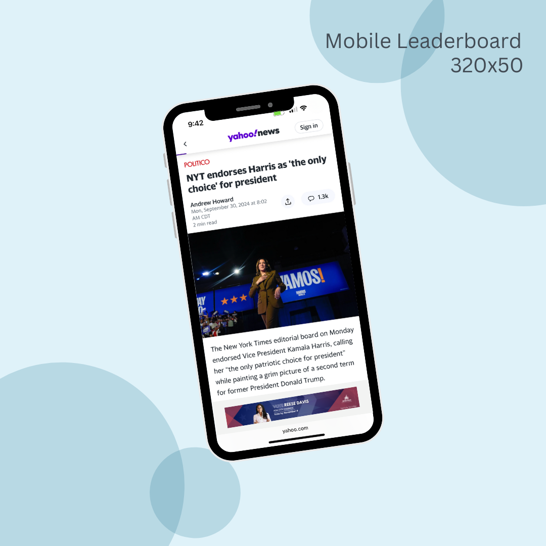 A cell phone with a news article on the screen.