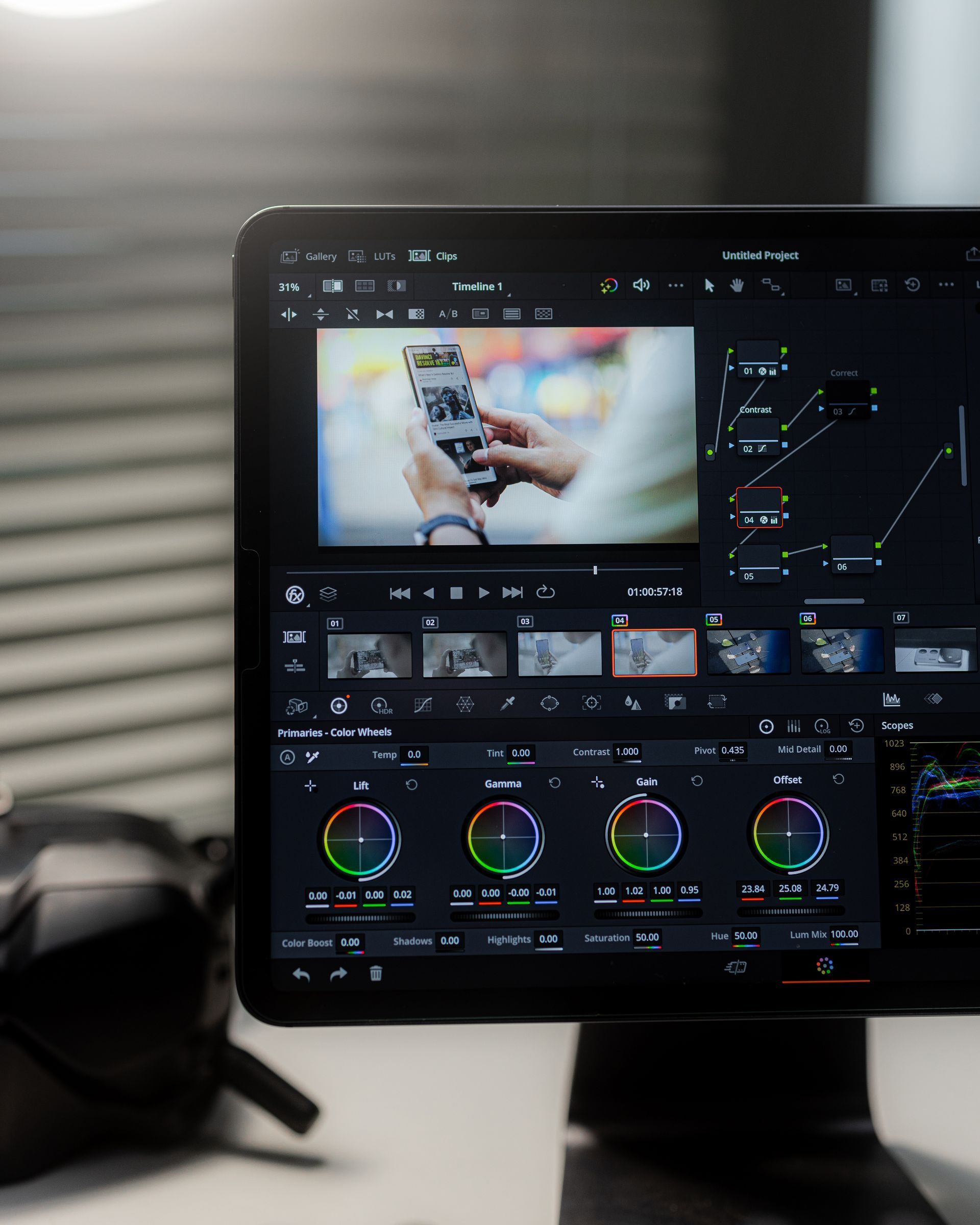 A computer monitor with a picture of a person holding a camera on it