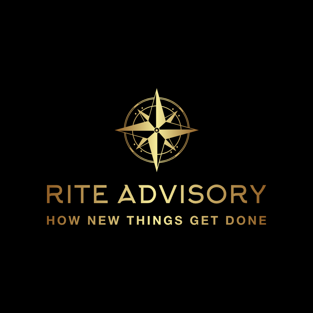 Gold compass logo with the words