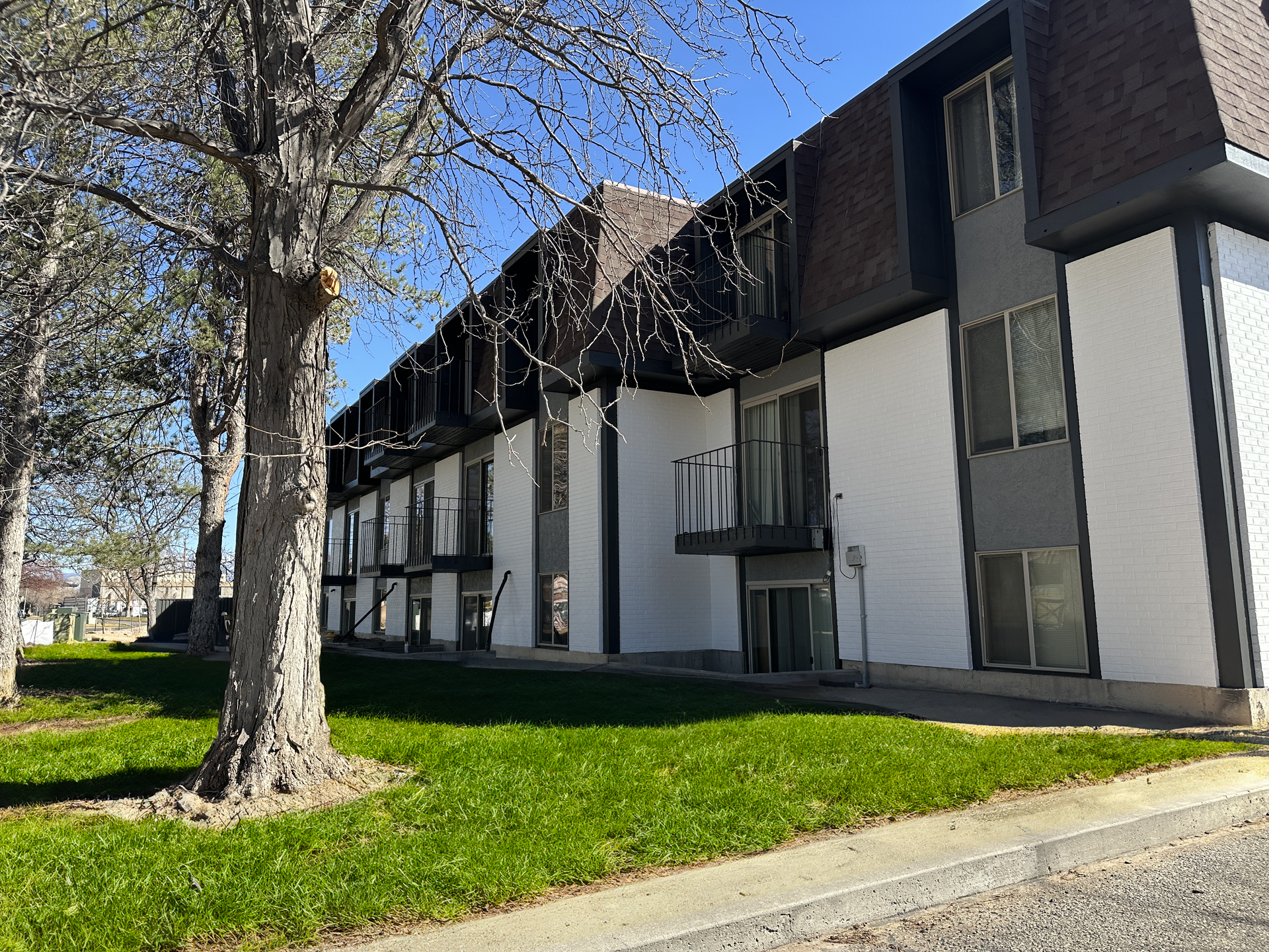 A sign for north star apartments is in front of a building.