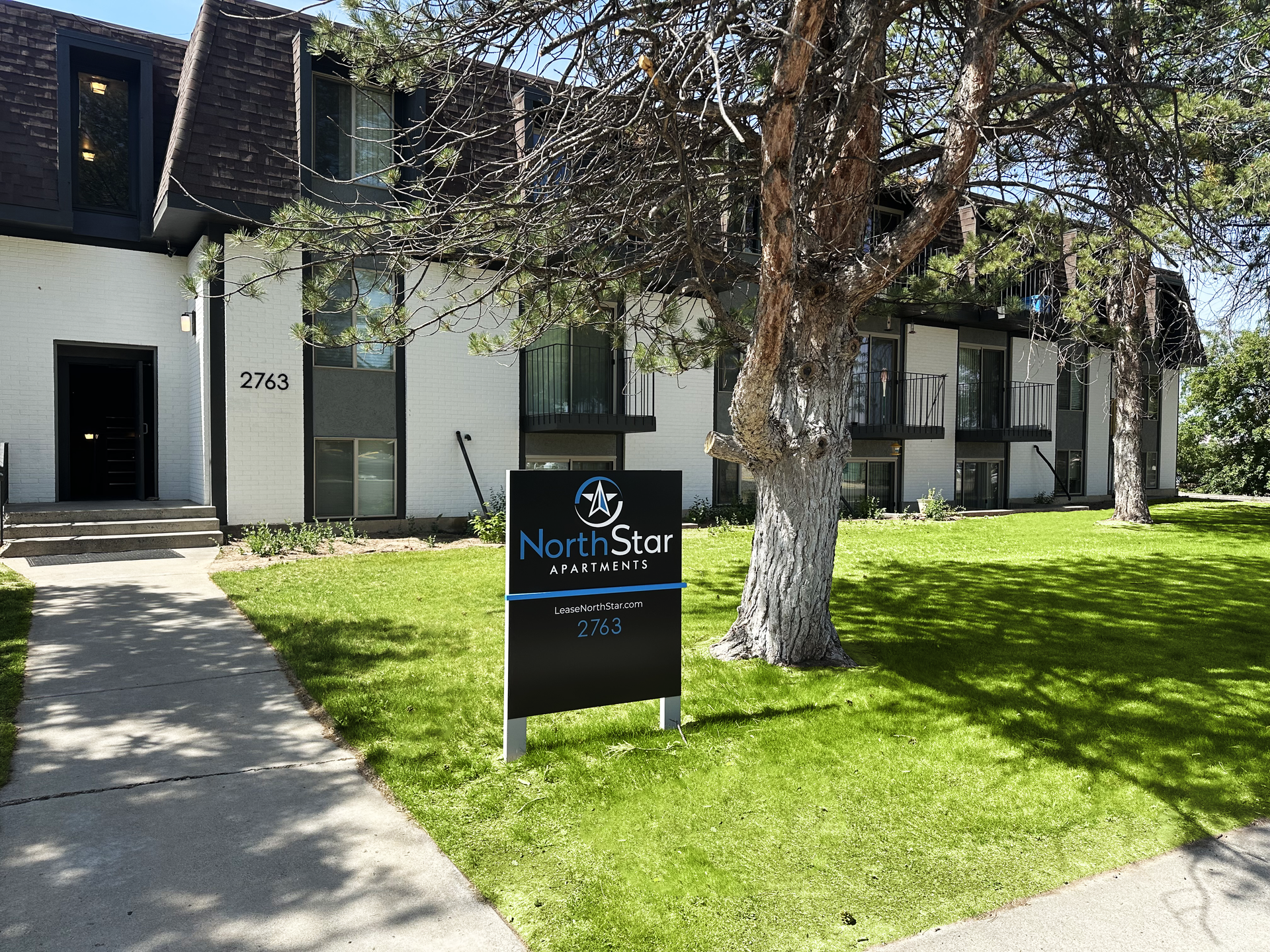 A building with a sign in front of it that says north star