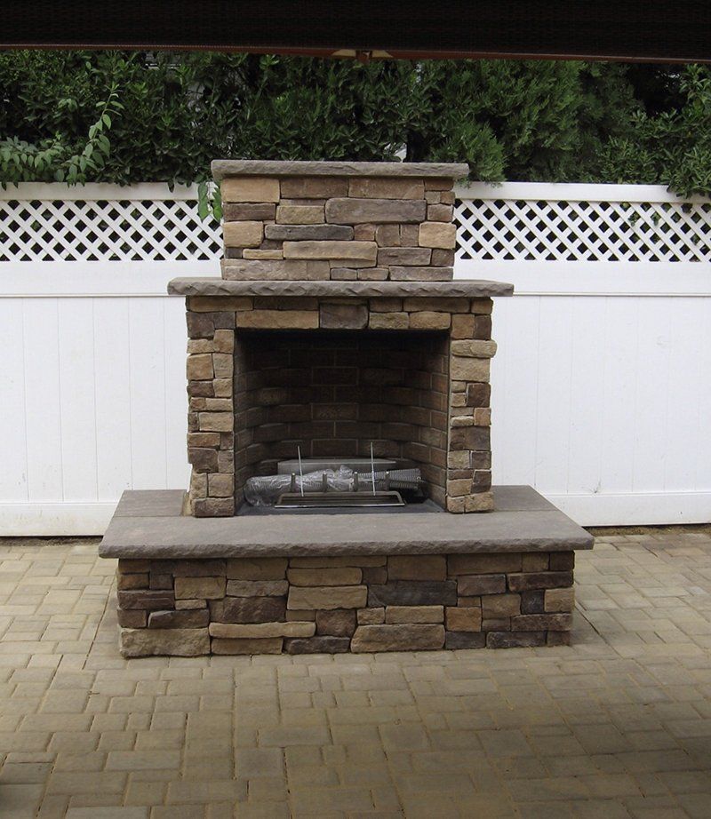 outside brown stone fire place front view