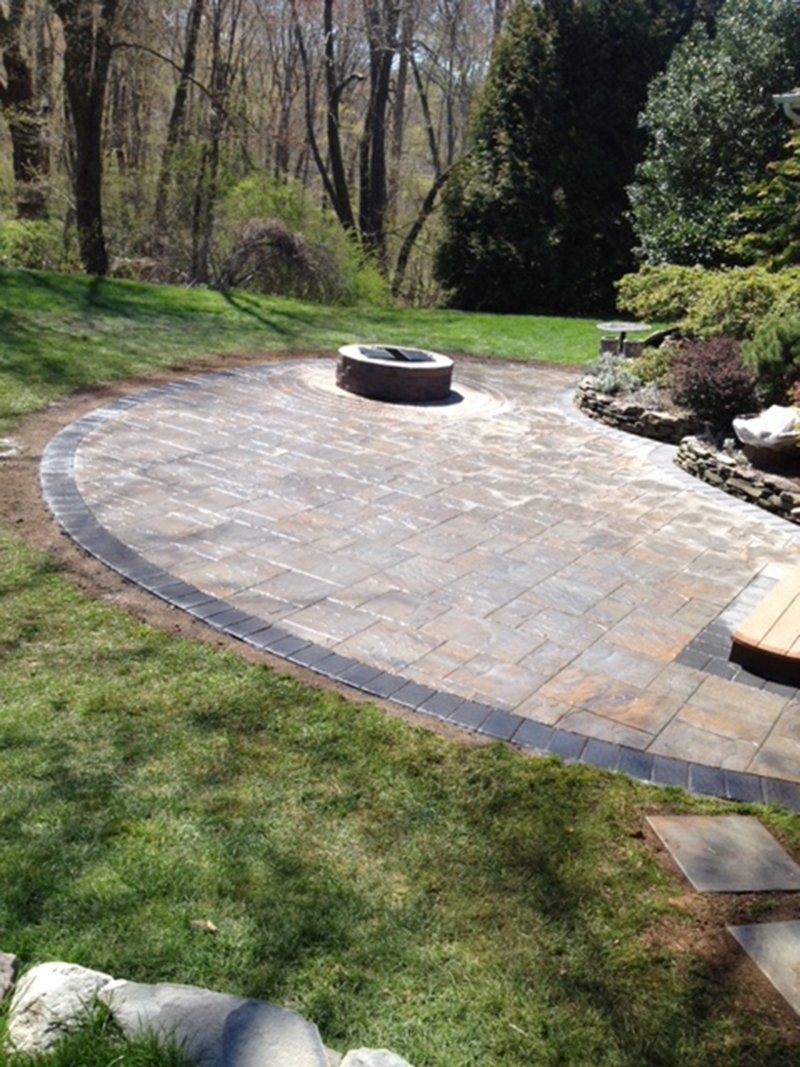 round fire place with round rocks around it's base