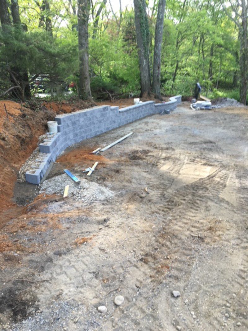 stone wall fence under construction