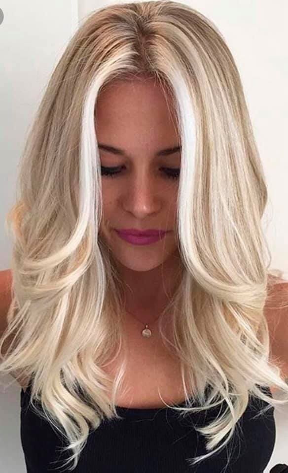 Blonde Curled Hair From Front — Hairdresser in Emerald, QLD