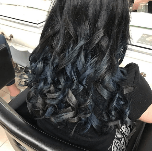 Black & Blue Curled Hair — Hairdresser in Emerald, QLD