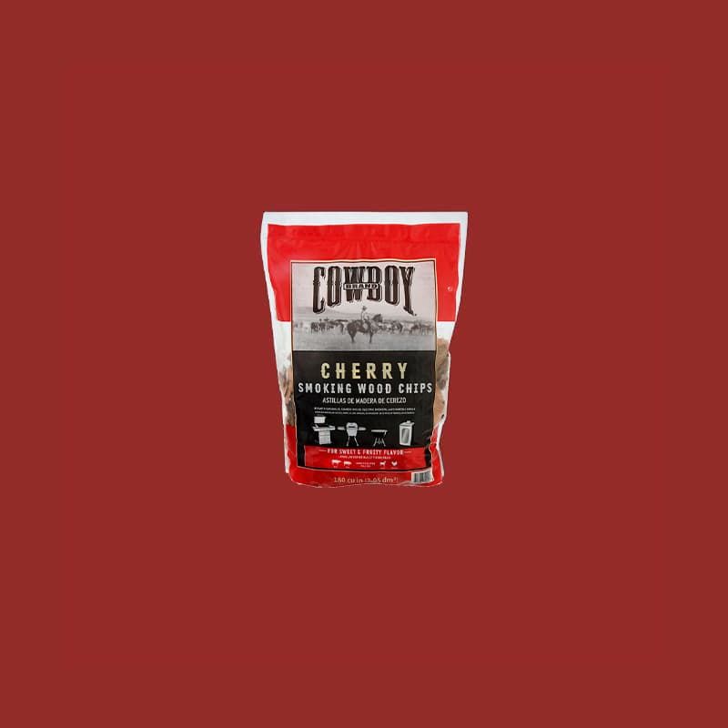 A bag of Cowboy cherry smoking wood chips on a red background.