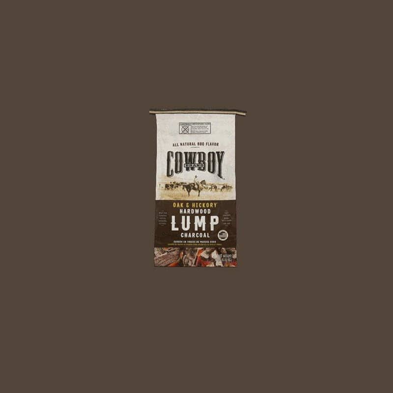 A bag of cowboy lump wood charcoal on a brown background.
