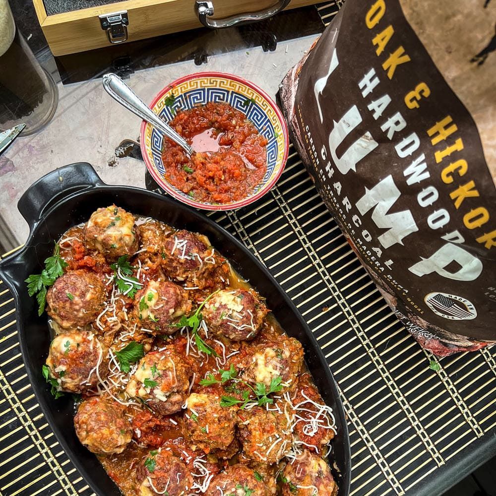 Italian Meatballs plated with bag of Cowboy Oak & Hickory Hardwood Lump
