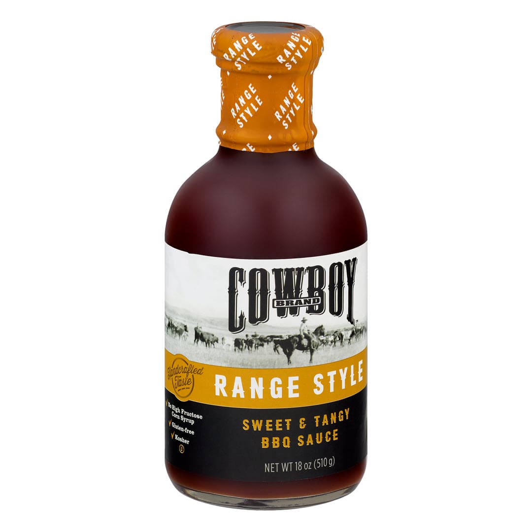 Left facing Bottle of Cowboy Range Style Sweet & Tangy BBQ Sauce
