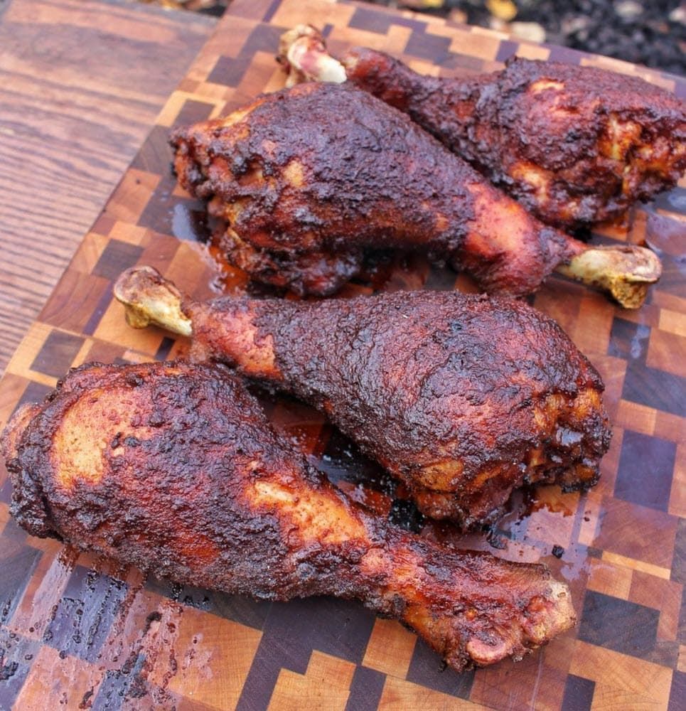 BBQ turkey legs on a cutting board