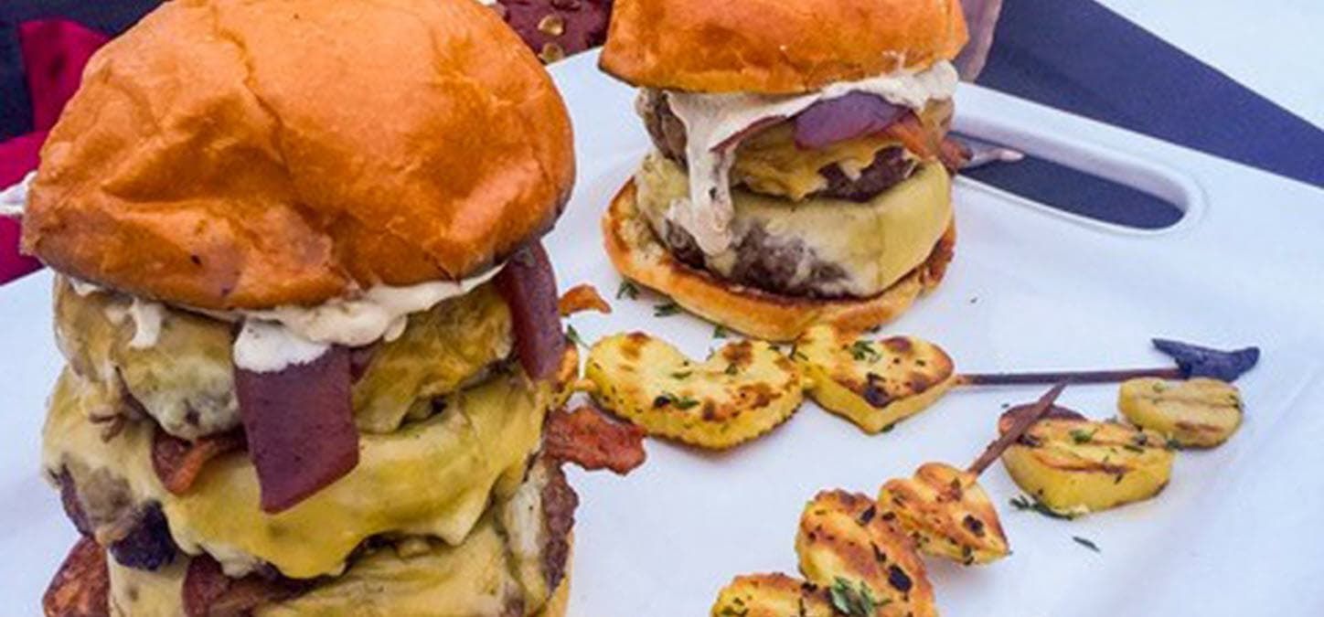Merlot burgers stacked high with grilled herb potatoes in shape of hearts