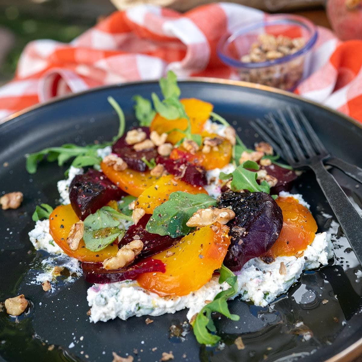 roasted beets and arugula on bed of goat cheese