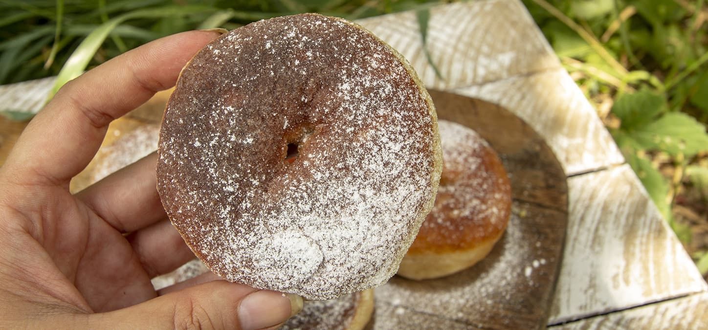 grilled cowboy donuts sprinkled with powdered sugar