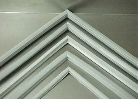 A close up of a picture frame with a gray background