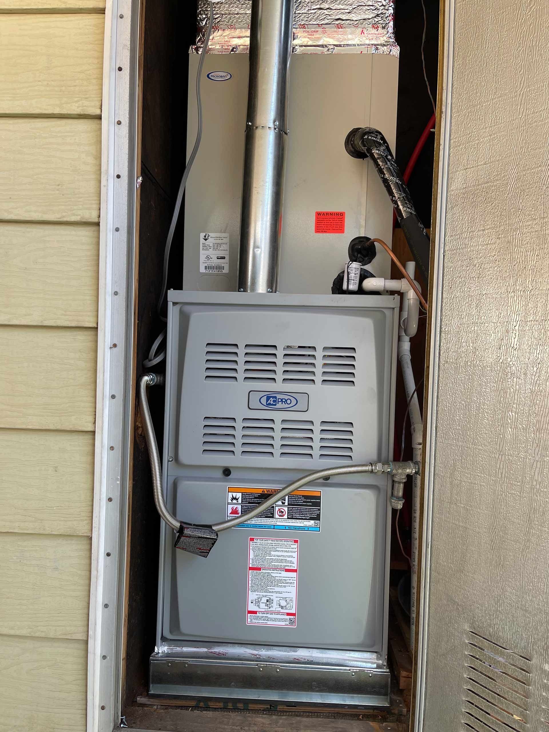 An air conditioner is installed in a doorway of a house
