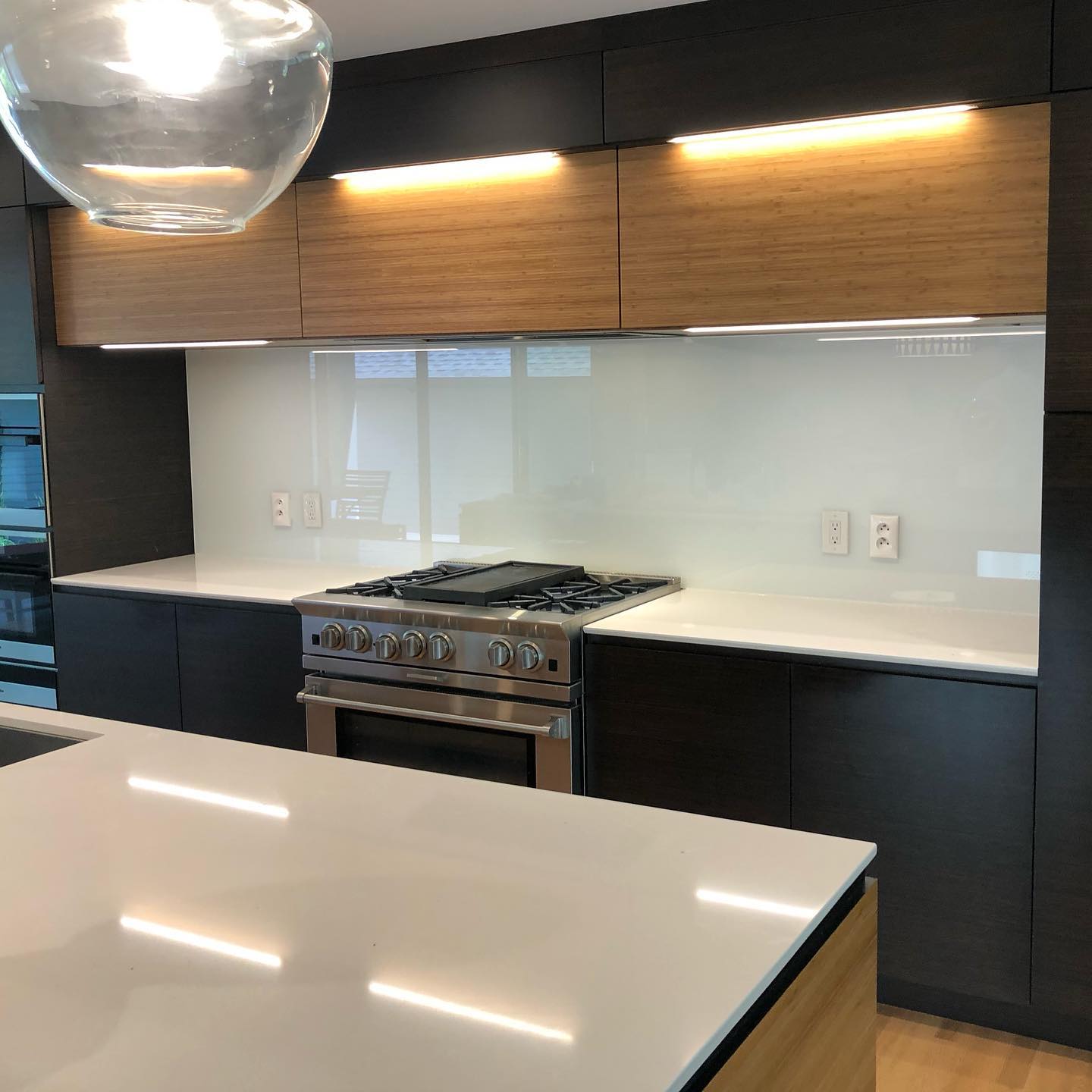 glass backsplash, picture frame glass, and any custom glass project installed by our technicians