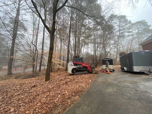 Excavator Machine on the Road — Loganville, GA — Georgia's Best Clearing & Grading