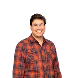 Man in red plaid shirt smiles, poses in front of blue and white gradient backdrop.