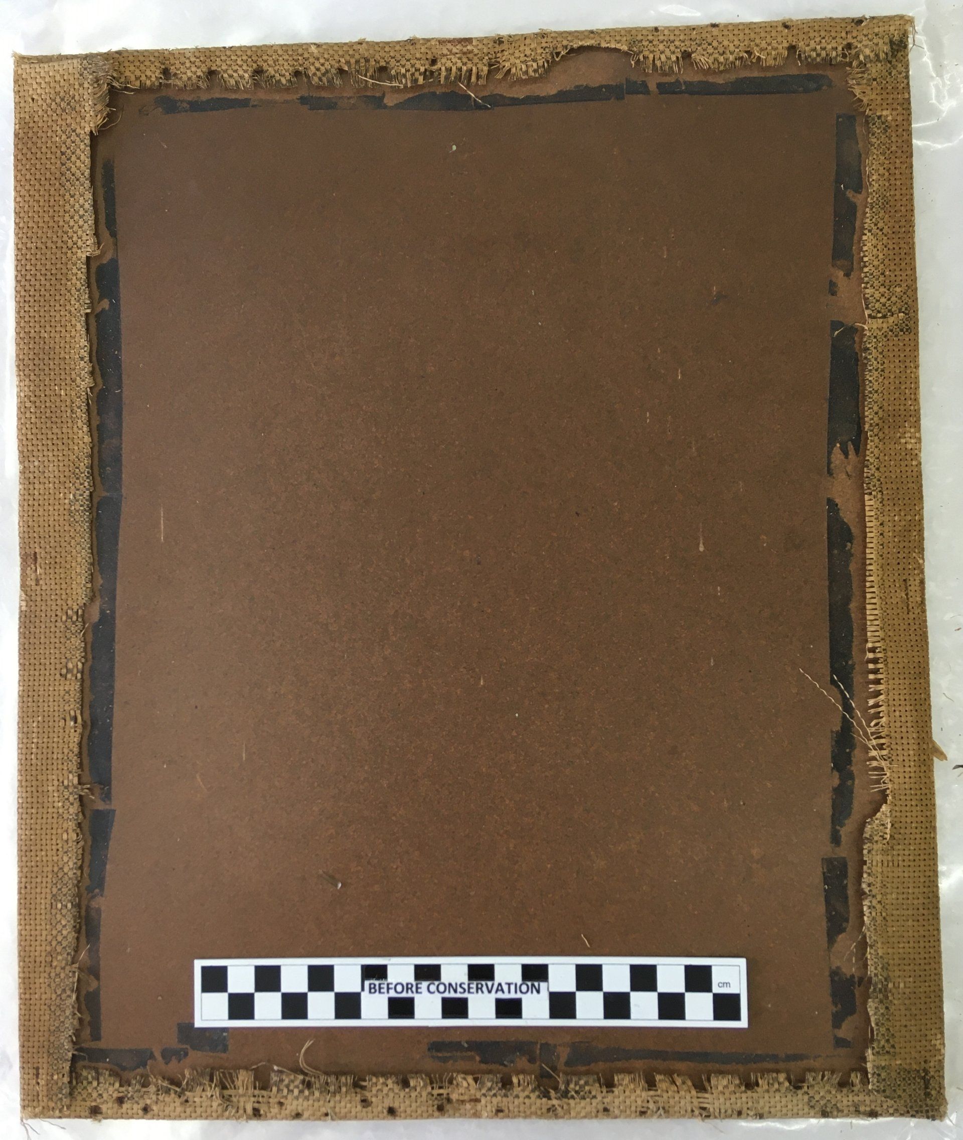 Prior to removal of old backing board and tapes