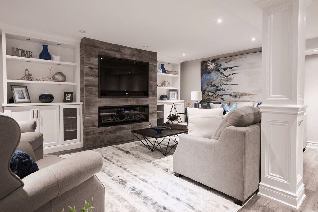 A living room filled with furniture and a flat screen tv.