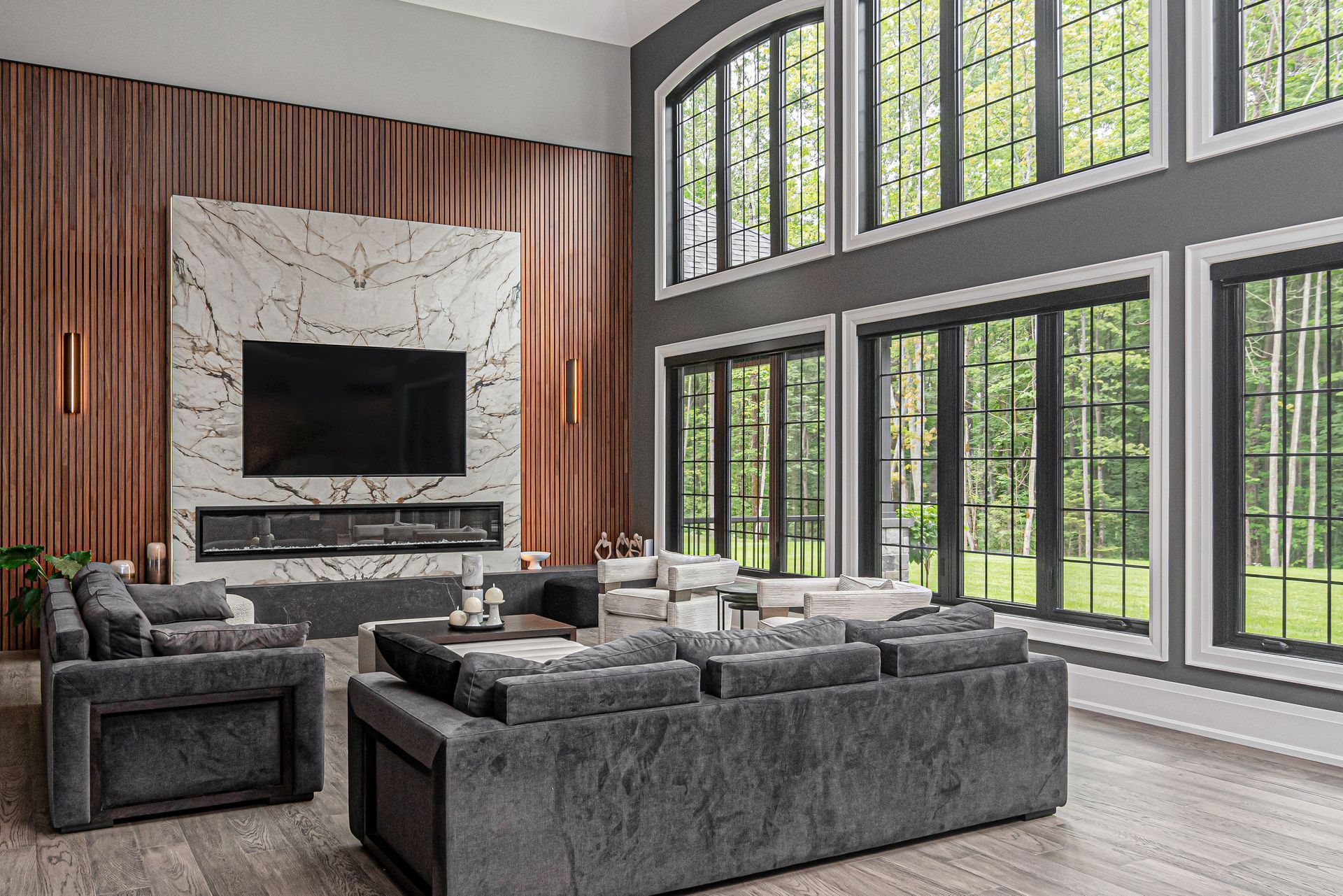 A living room filled with furniture and a flat screen tv.