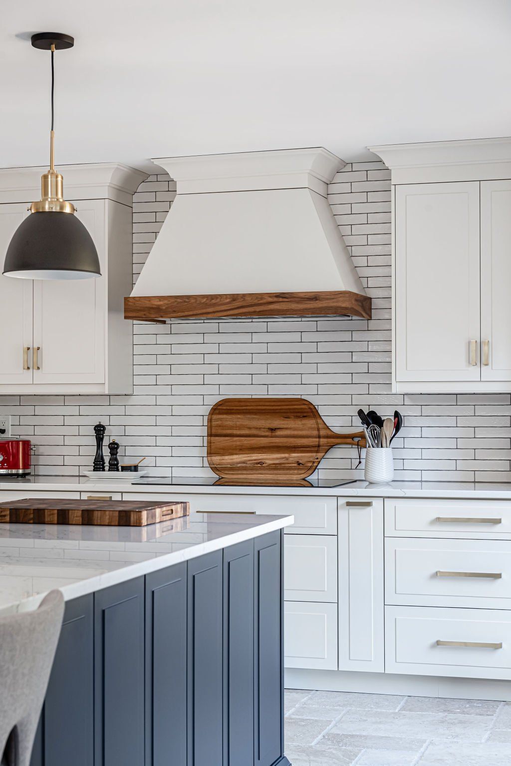 glamorous kitchen surrounded by wooden cabinets
