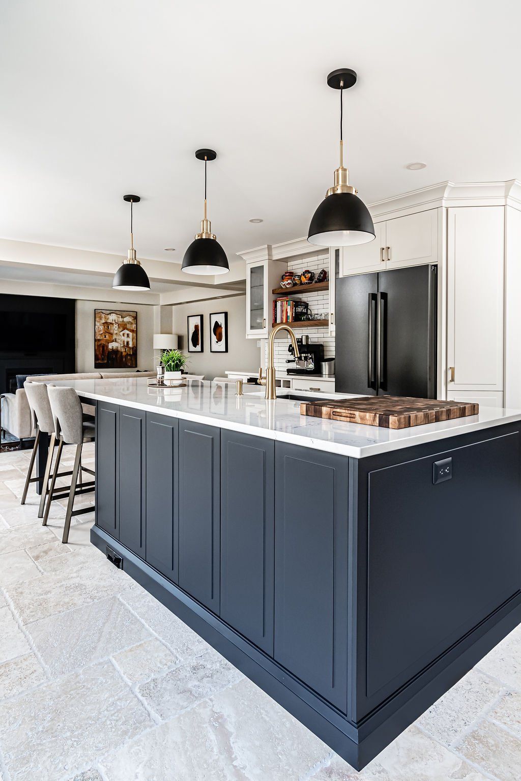 There is a large island in the middle of the kitchen.