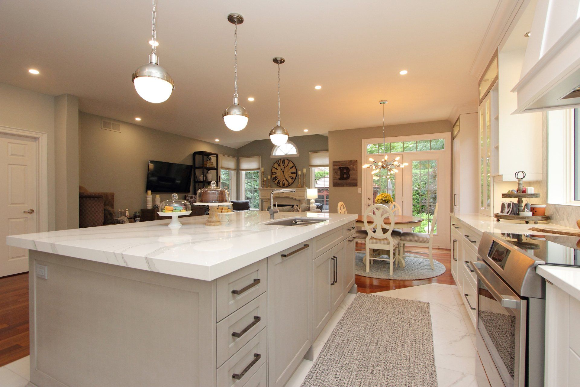 There is a large island in the middle of the kitchen.