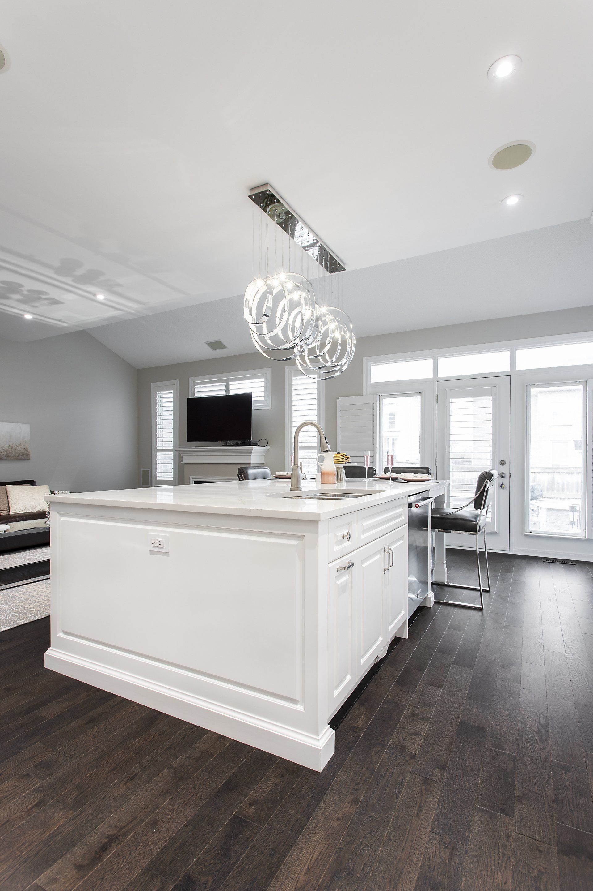 A kitchen with a large island in the middle of the room.