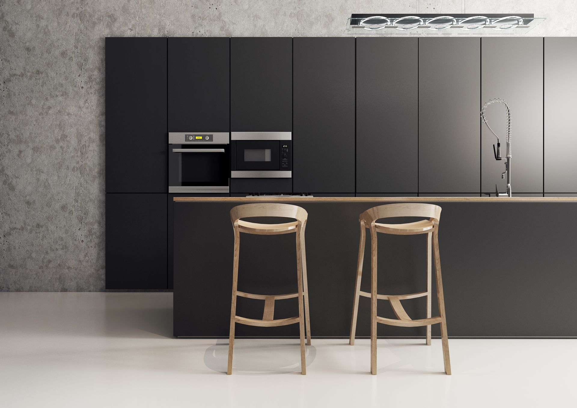A kitchen with black cabinets and wooden bar stools