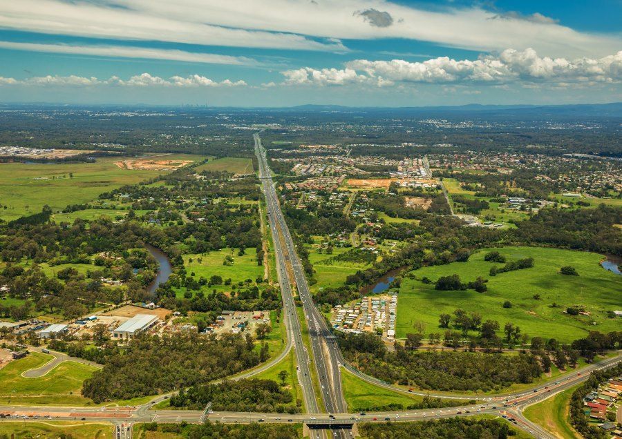 An Aerial View of a Highway Surrounded by Trees and Fields — Trucking Crane Trucks in Caboolture, QLD