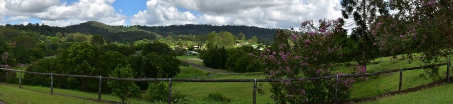 A Panoramic View of a Field With Trees and Mountains in the Background — Trucking Crane Trucks in Nambour, QLD