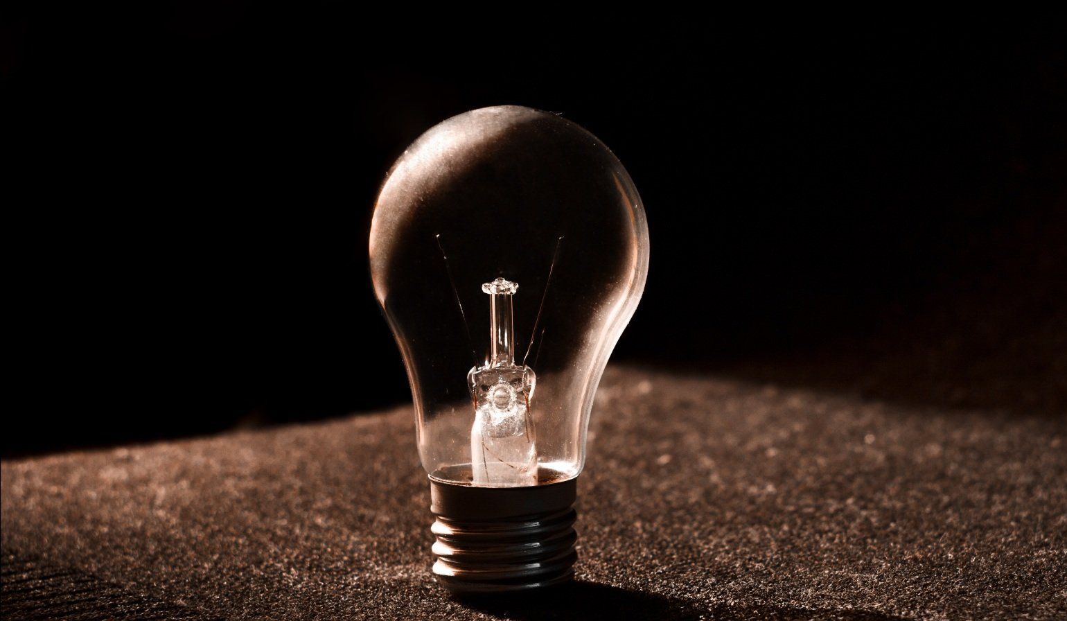 Picture of lightbulb in dark room