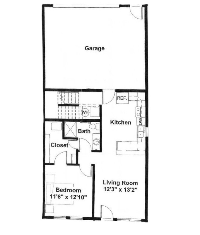 Floor plan showing a garage, kitchen, living room, bedroom, bathroom, and closet layout.
