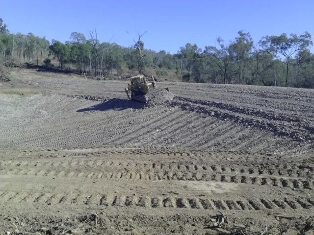 Bulldozer Is Doing Land Cleaning — Mike Barlow Earthmoving Pty Ltd in Rockhampton, QLD