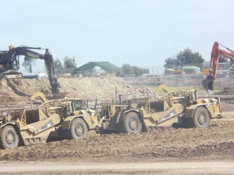 Orange And Yellow Excavator — Mike Barlow Earthmoving Pty Ltd in Rockhampton, QLD