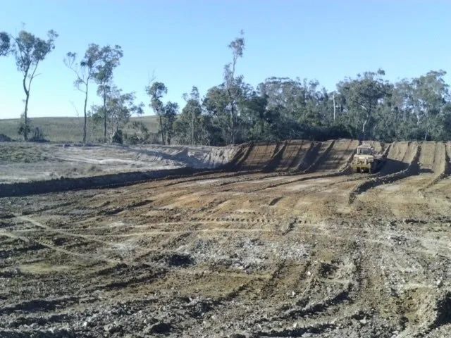 A Bulldozer Is Doing A Land Clearing — Mike Barlow Earthmoving Pty Ltd in Rockhampton, QLD