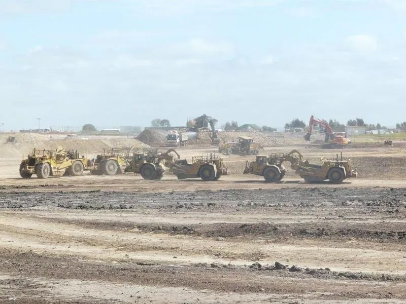 So Many Working Excavators With Dirt Piles And Excavator In Background — Mike Barlow Earthmoving Pty Ltd in Rockhampton, QLD