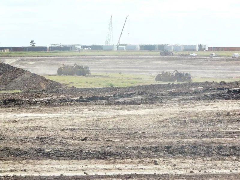 Two Bulldozers Are Working For Construction Of Dam — Mike Barlow Earthmoving Pty Ltd in Rockhampton, QLD