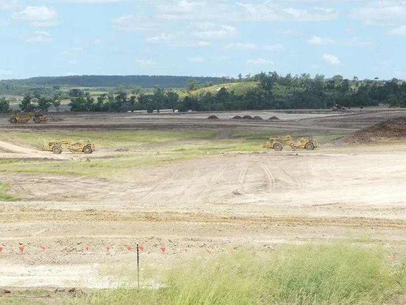 Wide Landscape Dirt Area With Mountains In Background — Mike Barlow Earthmoving Pty Ltd in Rockhampton, QLD